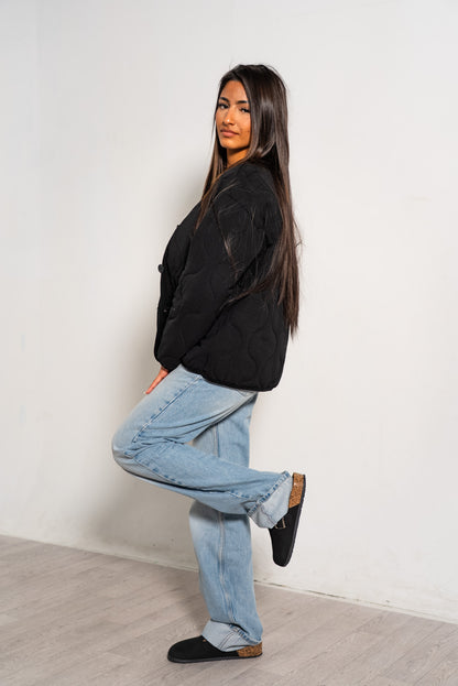 Veste noire à boutons